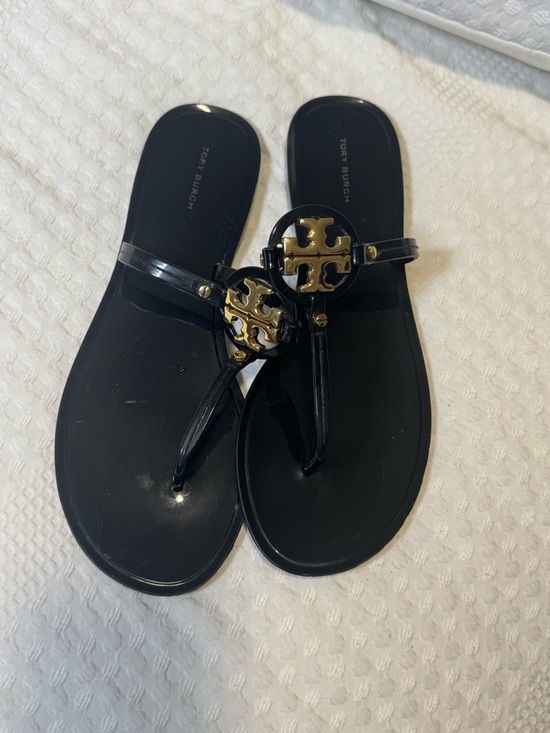Tory Burch Shoes - Tory Burch Black Jelly Logo Thong Sandals with Gold Emblem